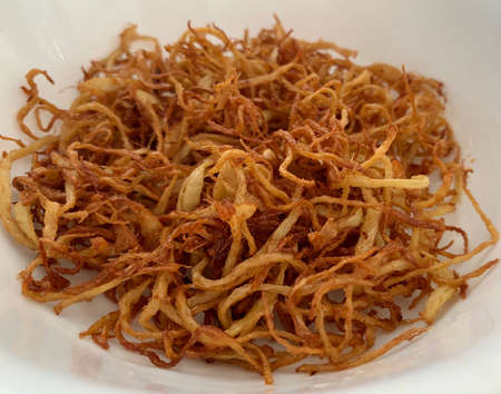 Delicious fried ginger. A great mixture of any dish. Asian cookingの写真素材