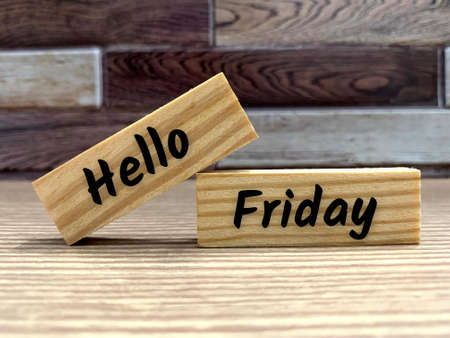 Text on wooden blocks - Hello Friday. Greetings conceptの写真素材