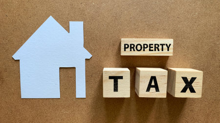 Top view of property tax text on wooden blocks.の写真素材