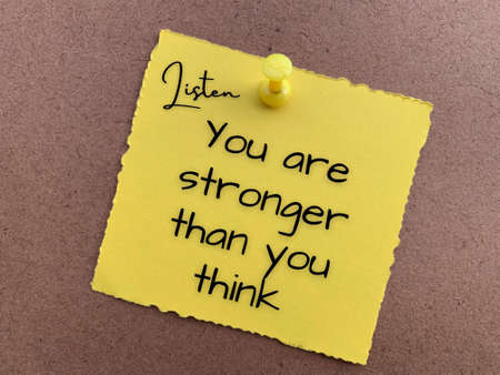 You are stronger than you think text on yellow notepad. Conceptualの写真素材