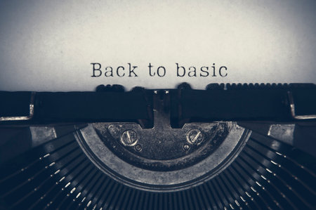 Back to basic text on an old typewriter. Lifestyle concept.