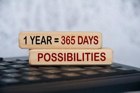 365 possibilities text on wooden blocks on top of keyboard. Lifestyle and motivational concept.