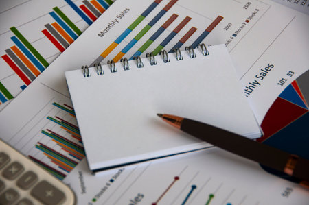 Blank notepad with customizable space for text with graph analysis background. Copy space and...