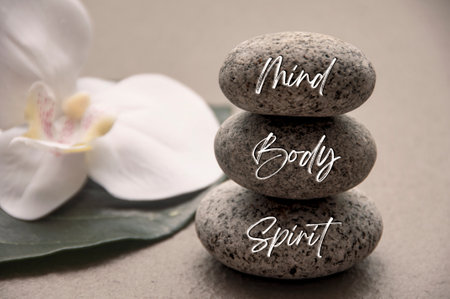Mind, Body and Soul words engraved on zen stones with space for text. Health life concept.の写真素材