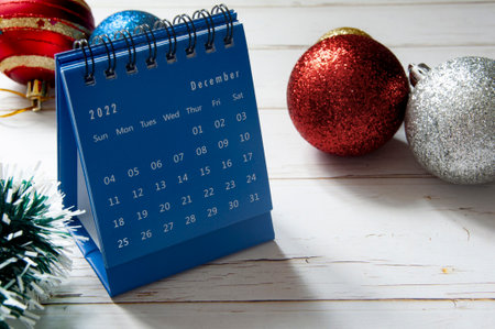 Christmas decoration and blue December calendar with customizable space for text. Christmas...