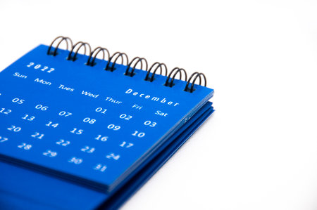 December 2022 blue desk calendar on white background with customizable space for text. Calendar concept.の写真素材
