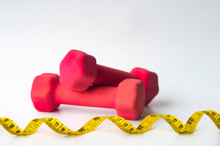 Dumbbell on white background cover. Weight loss conceptの写真素材