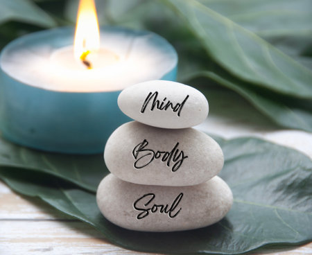 Mind, Body and Soul words engraved on zen stones. Zen concept.の写真素材