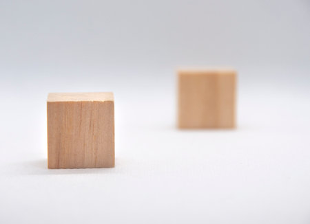 Close up of wooden cube with customizable space for text or ideas. Copy space