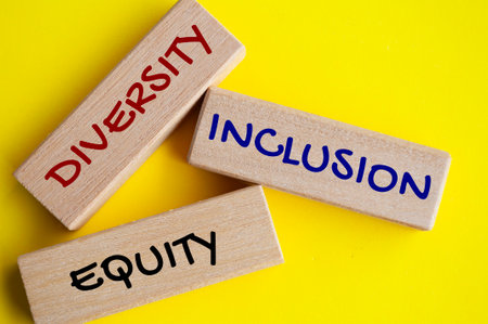 Top view of close up wooden blocks with text - Diversity, inclusion and equity. Diversity concept.の写真素材