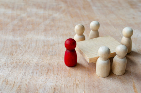 Wooden figure having meeting or discussion. Meeting conceptの写真素材