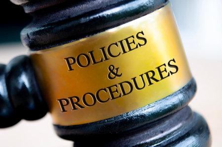 Policies and Procedures text engraved on gavel. Policies and procedures conceptsの写真素材
