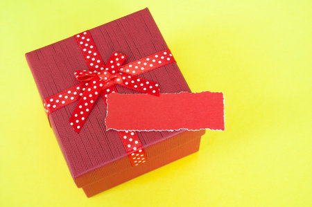 Red color present on white background with customizable red paper space for text.の写真素材
