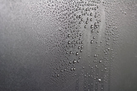 Side view of water droplets suitable for wallpaper background.