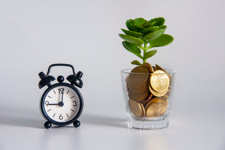 Healthy plant rising from gold. Smart investments leading to prosperity conceptの写真素材