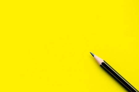 Top view of yellow background with customizable space for text.の写真素材