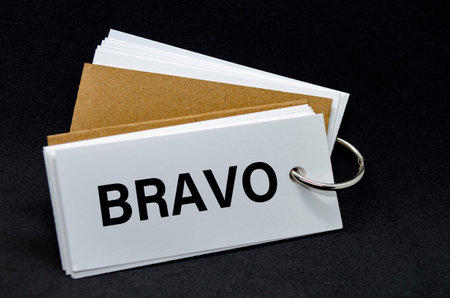 BRAVO text on white notepad. A Simple Gesture, A Powerful Message of Recognition and Encouragement.