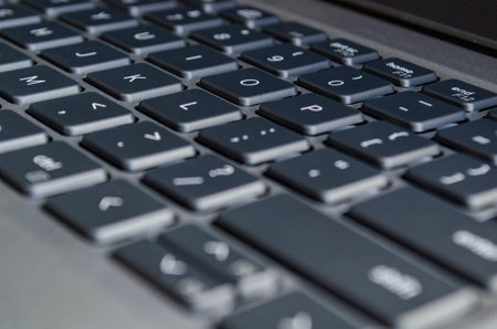 Laptop keyboard view symbolizing digital workspace and potential surface for cybersecurity risks