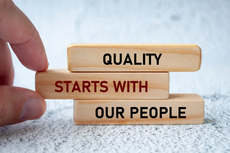Quality Starts With Our People text on wooden blocks.の写真素材
