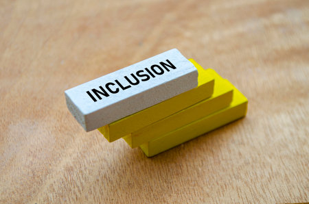 Inclusion steps represented by ascending white and yellow blocks.