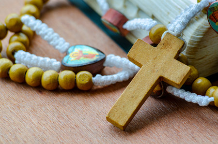 Rustic Rosary With Cross in Horizontal Frame.の写真素材