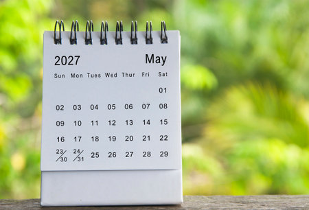 May 2027 calendar with blurred nature background. Copy space.
