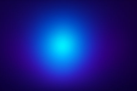 Bright central turquoise glow with surrounding dark space in smooth diffusion.の素材