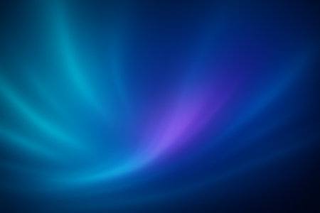 Cyan glowing swirls blending with blue and teal light gradients smoothly.の素材