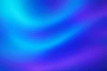 Purple and blue streaks blending with curved light beams flowing in motion.の素材