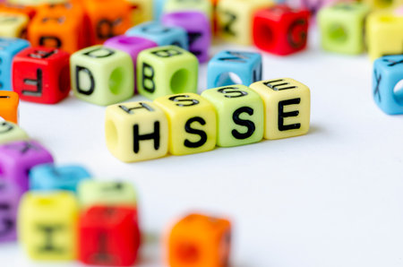 HSSE text on yellow cubes representing Health, Safety, Security and Environment. Health and Safety conceptの写真素材
