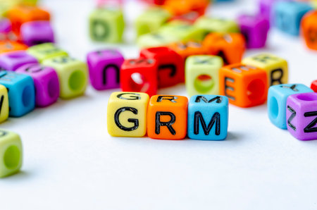 GRM text on multicolored cubes representing Grievance Redress Mechanism. Conservation conceptの写真素材