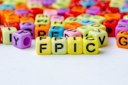 FPIC text on multicolored cube representing Free, Prior and Informed Consent. Conservation conceptの写真素材