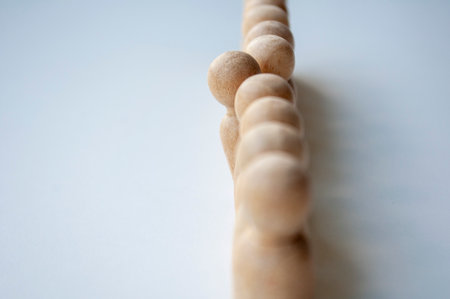 A wooden peg stood out to speak out, representing courageの写真素材