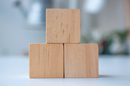 Close up of wooden cubes with customizable space for text
