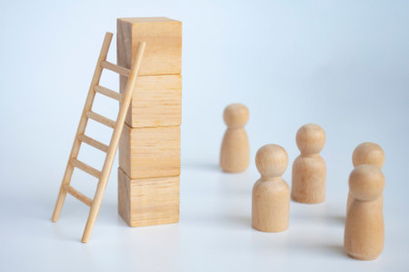 Staking wooden cubes with peg figures with customizable space for text or ideasの写真素材