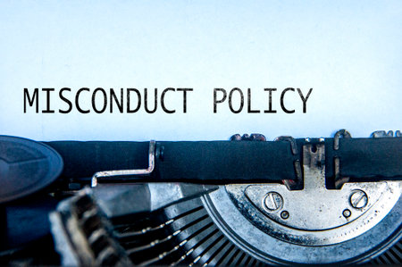 Misconduct Policy text on an old typewriter. Misconduct Policy conceptの写真素材