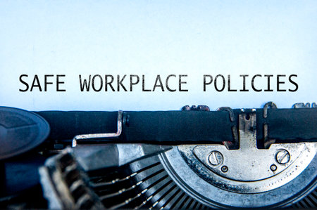 Safe Workplace Policy text on an old typewriter