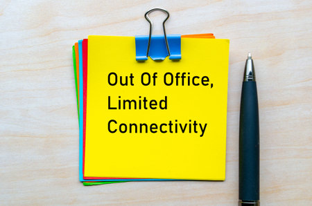 Out of office notification, limited connectivity. Away from office conceptの写真素材