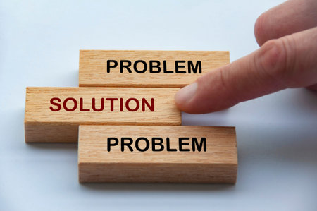 Problem and Solution text on wooden blocks illustrating solution focused thinking over repetitive...