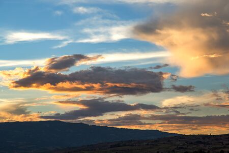 Multiple exposure of a cloud formation at sunset. Captured at the Andean mountain of central Colombia.の写真素材
