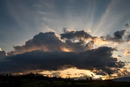Multiple exposure of a wonderful cloudy sunset in the Andean mountains of central Colombia.