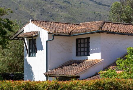 Partial view of an abandoned colonial country house with the light of the morning sun, near the colonial town of Villa de Leyva, in the Andean mountains of central Colombia.の写真素材