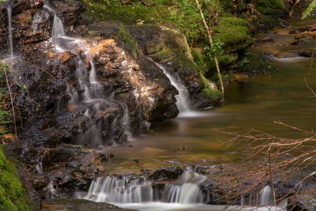 Multiple exposure of the stream of a river in the highlands of the Andean mountains of central Colombia.の写真素材