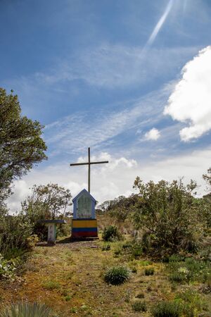 A shrine of the Virgin Mary near the Laguna Verde, at the Teatinos paramo in the highlands of the Andean mountains of central Colombia.の写真素材