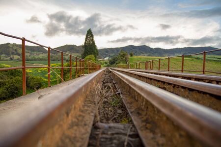 Perspective view of train tracks that goes over the Teatinos river, in the highlands of the Andean mountains of central Colombia.の写真素材