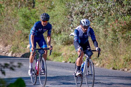 Villa de Leyva, Boyaca, Colombia - December 1, 2019:  Men and women of all ages ride bicycles during the development of the Gran Fondo Nairo Quintana cycling event, in which Nairo Quintana and Egan Bernal participated.のeditorial素材