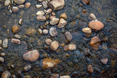Top view photography of  river rocks captured at the El Valle river in the south of the department...