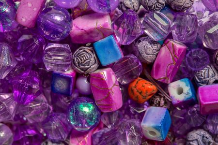 Macro photography of some colorful beads of different shape used for manufacturing jewerly and accesories.の写真素材