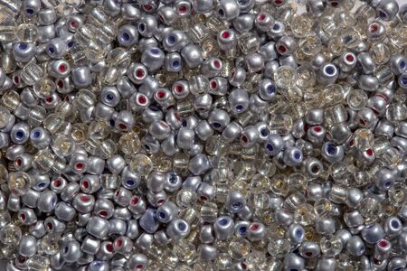 Macro photography of some colorful beads of different shape used for manufacturing jewerly and accesories.の写真素材