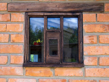 Close-up photography of a wooden window of a contry house near the colonial town of Villa de Leyva, in the central Andean mountains of Colombia.の写真素材